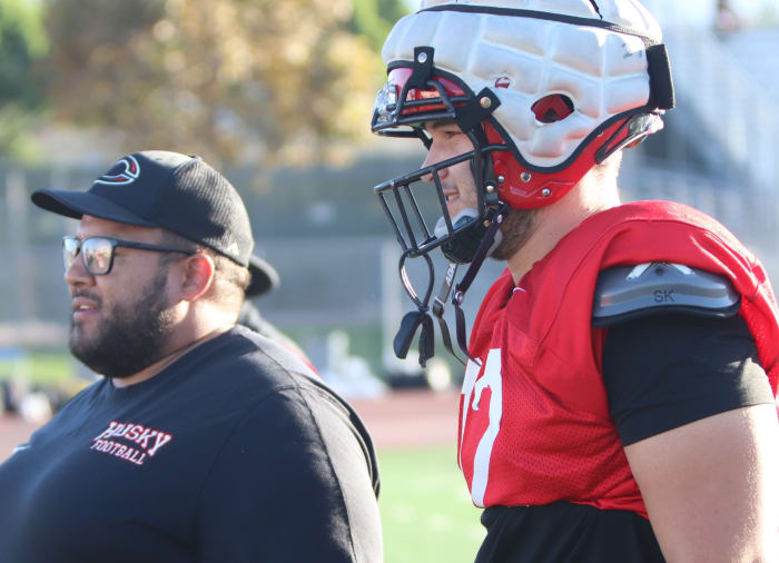Brent Helton with assistant coach.
